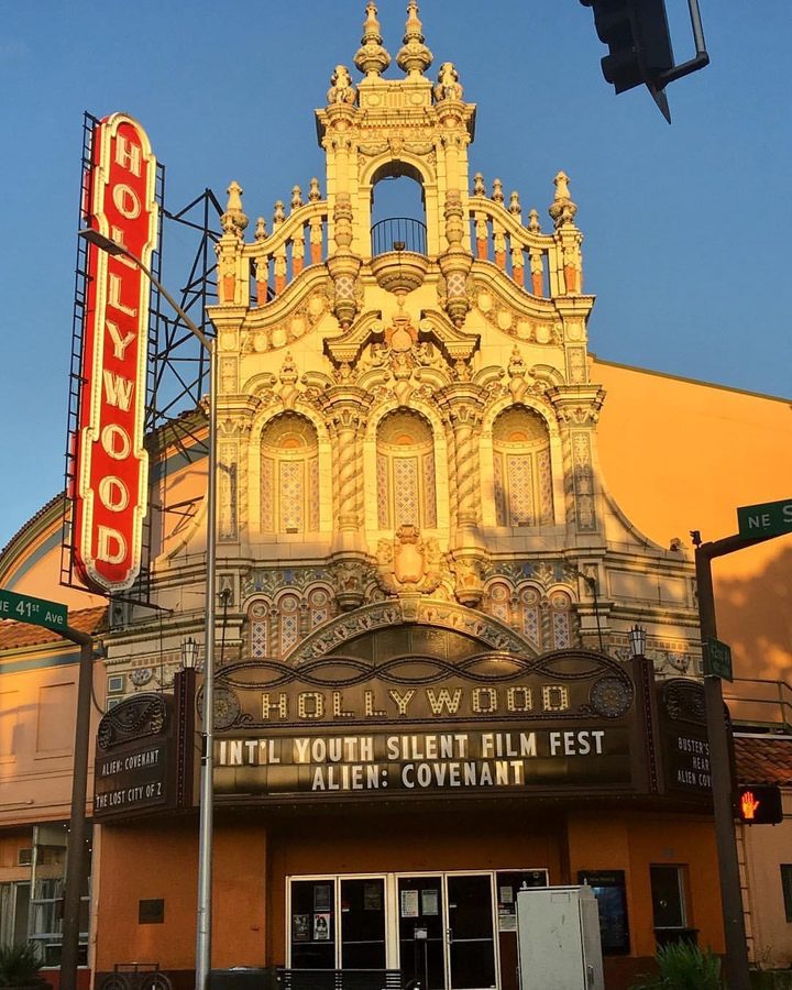 Hollywood Theatre's ornate facade and neon marquee in Northeast Portland