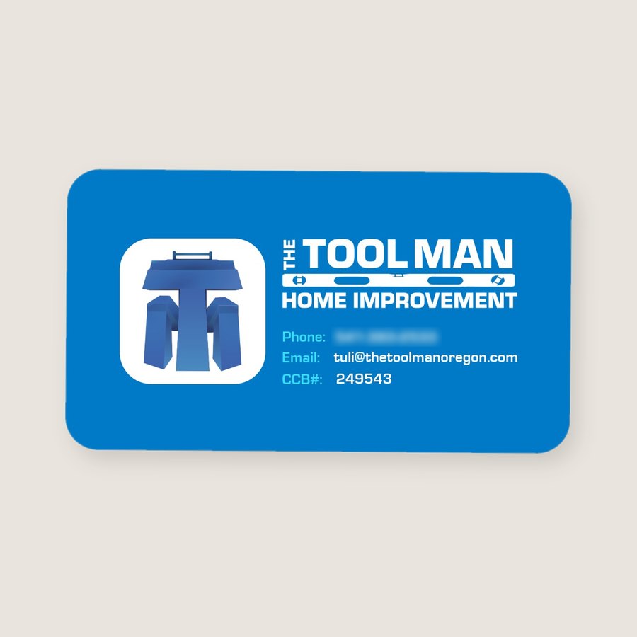 The Tool Man Home Improvement business card: a bright blue card with a 3D T-shaped tool logo and a level-bar wordmark